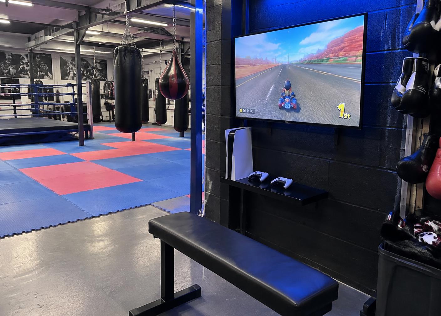 Stay and Play gaming area beside the boxing gym floor